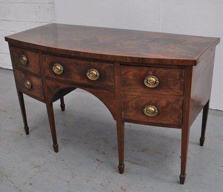A George III mahogany bow fronted sideboard
