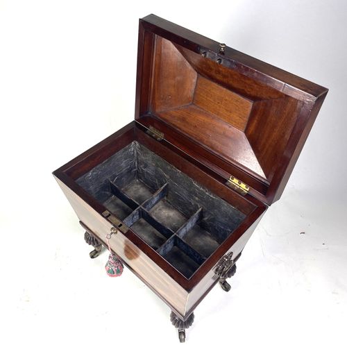 Small Regency mahogany sarcophagus shaped Cellarette 