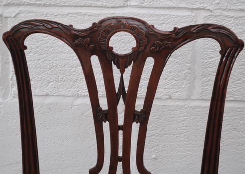 Set of eight Chippendale style dining chairs