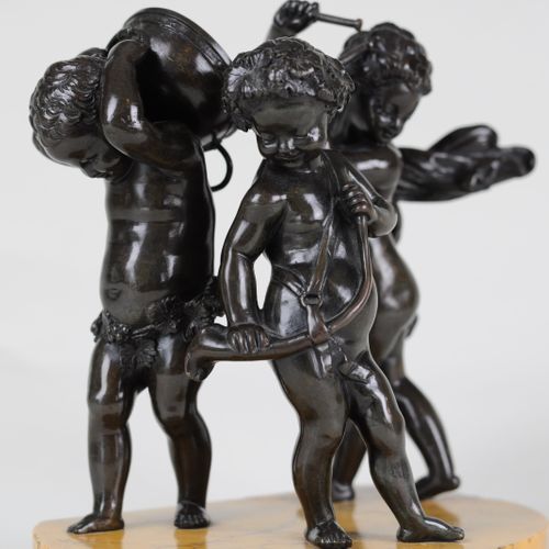 Bronze group of musical putti