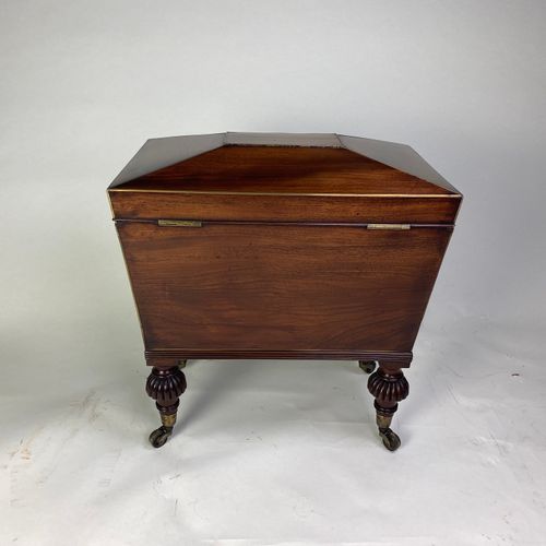 Small Regency mahogany sarcophagus shaped Cellarette 