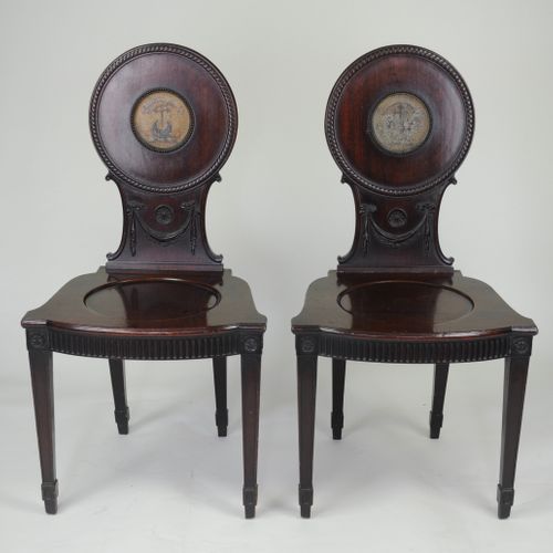 Pair of mahogany Hall Chairs with painted armorials