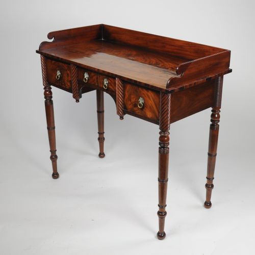 Regency figured mahogany side table with gallery