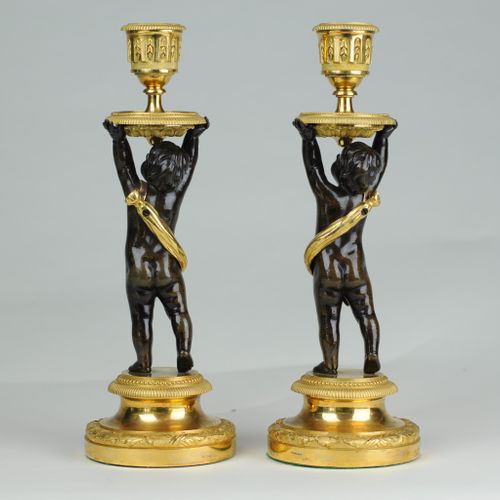 Fine pair of bronze & ormolu putti candlesticks