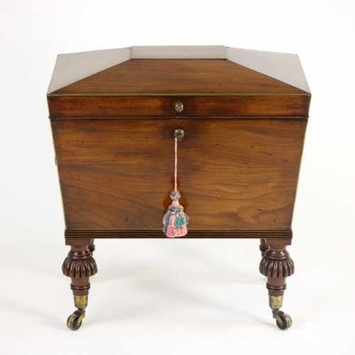Small Regency mahogany sarcophagus shaped Cellarette 