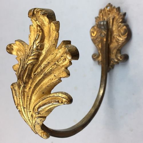 Pair of gilded brass curtain tie-backs