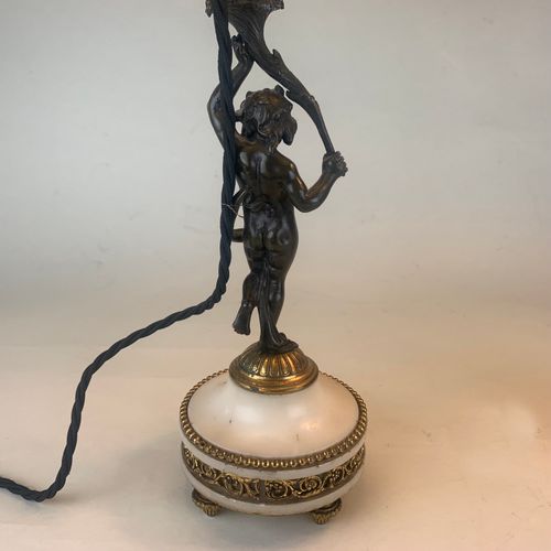 Pair of bronze putti table lamps