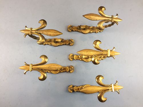Five Antique Gilded brass Fleur de Lis Curtain Tie-Backs