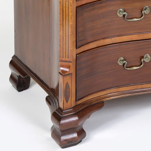 Georgian serpentine shaped mahogany and satinwood chest of drawers 