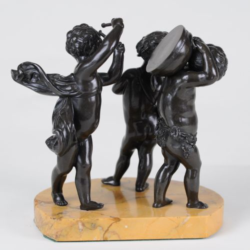 Bronze group of musical putti
