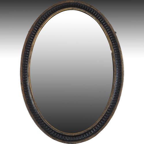 Mid 18th century oval black and gilt Mirror