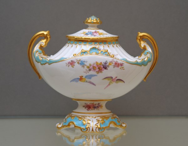 A Royal Crown Derby boat-shaped vase and cover
