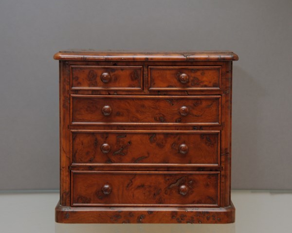 A Victorian miniature chest of drawers