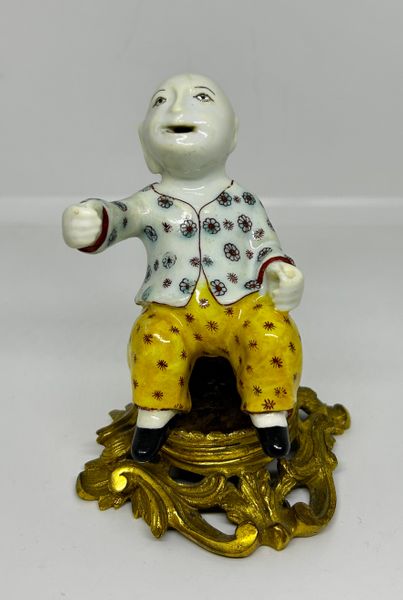 A Small Duke Du Villeroy Figure of a Seated Magot